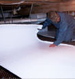 Leamington insulation being installed in a crawl space.
