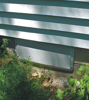 A gray crawl space vent cover in Wallaceburg