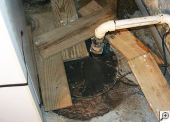 An ugly, clogged sump pump system in Leamington, Ontario
