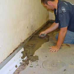 Testing a French drain system in a Kingsville home.