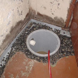 Installing a sump in a sump pump liner in a Sarnia home