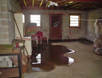 a flooded basement floor in a Lambton Shores home