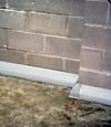 Our baseboard drain system installed on a corner in a Amherstburg basement.