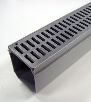 A closeup of our grated basement drainage pipe system, installed in Hanover