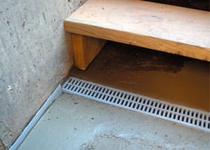 a hatchway entrance in Point Edward that has been protected from flooding by our TrenchDrain basement drainage system.