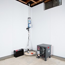 Sump pump system, dehumidifier, and basement wall panels installed during a sump pump installation in Aylmer