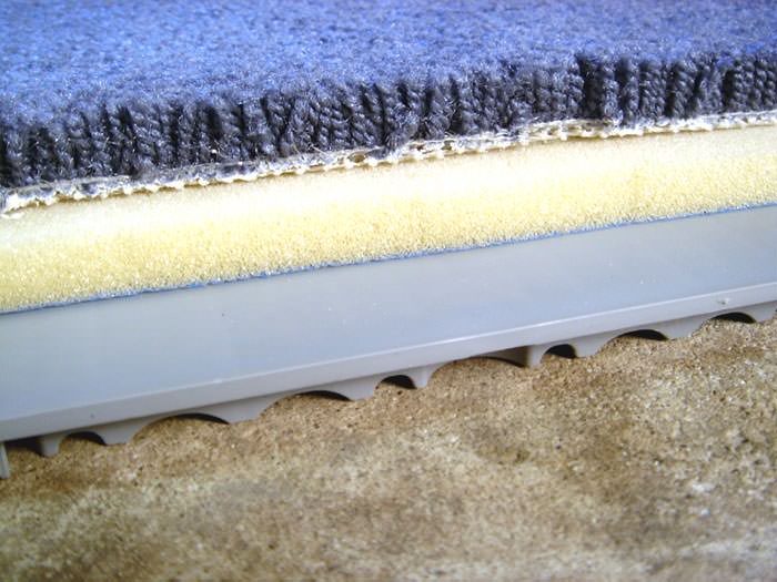closeup plastic subfloor tile 03lg